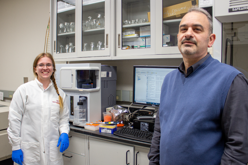 Tiffany Roach, left, with faculty advisor Daniel Capelluto.