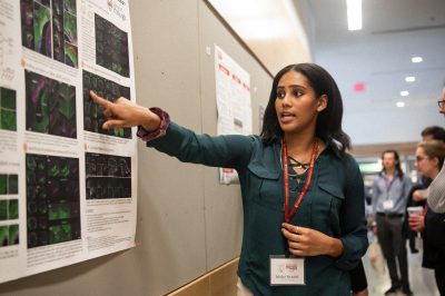 Malaz Sharief, a visiting student from University of Pittsburgh, during a poster presentation at the Meeting of the Minds conference. Photo by Ashley Wynn.